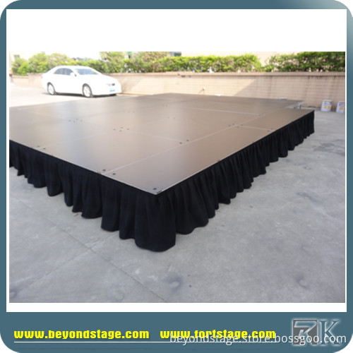 Glass surface portable stage with adjustable height legs
